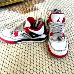 Air Jordans red white and black size 2.5 youth